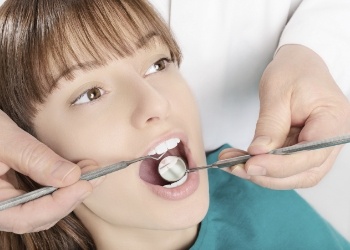 Woman receiving a dental exam