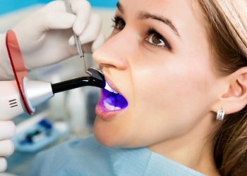 Woman receiving dental bonding
