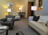 Couch and chairs in waiting area of Gorham dental office