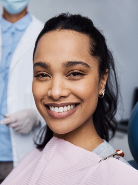 Woman grinning in dental chair