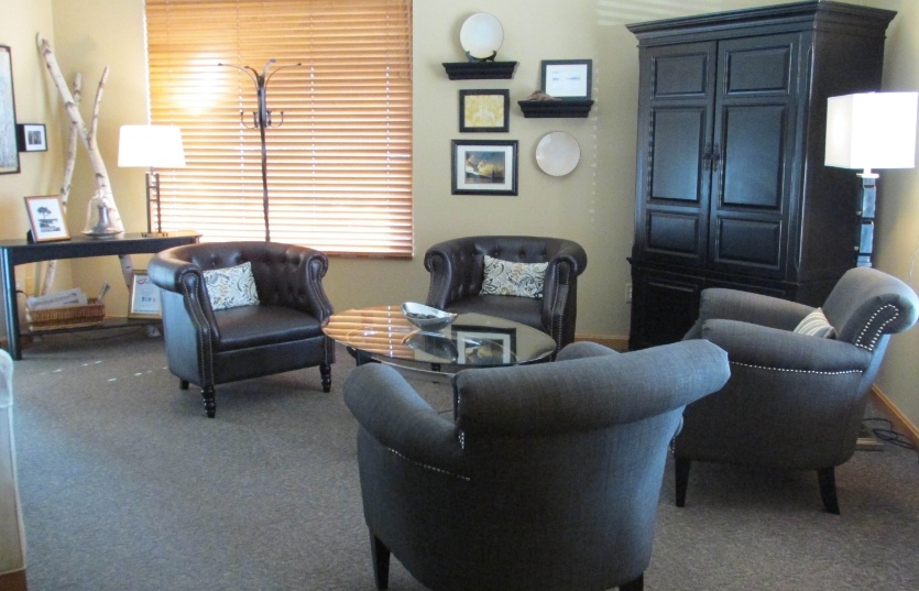 Three tables around small glass top table