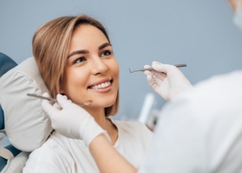 Woman smiling during dental checkup